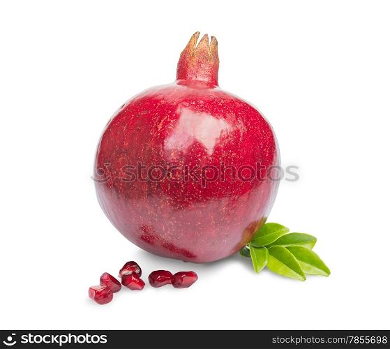 Juicy pomegranate fruit with leaves isolated on a white background