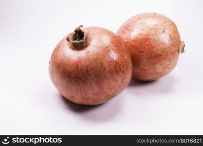 Juicy pomegranate on white background