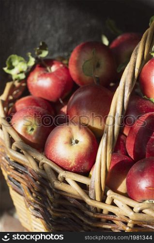 juicy red apples in a basket. aesthetics of rural life