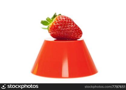 juicy strawberries on a bowl isolated on white