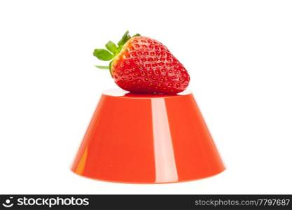 juicy strawberries on a bowl isolated on white