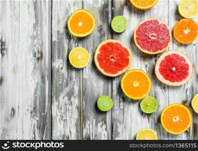Juicy sweet citrus. On white wooden background. Juicy sweet citrus.