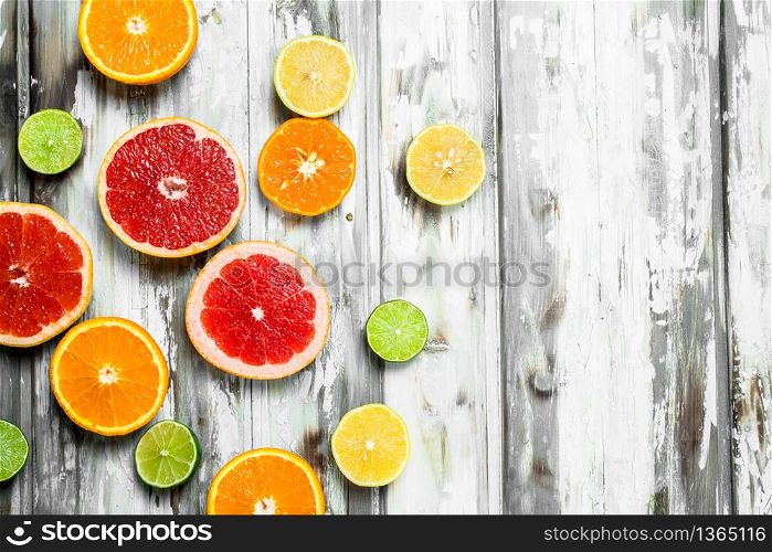 Juicy sweet citrus. On white wooden background. Juicy sweet citrus.
