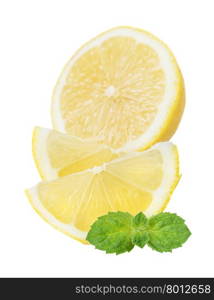 Juicy yellow cut lemon and green leaves of fresh mint isolated on white background
