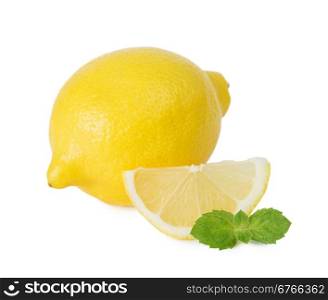 Juicy yellow lemon and green leaves of fresh mint isolated on white background