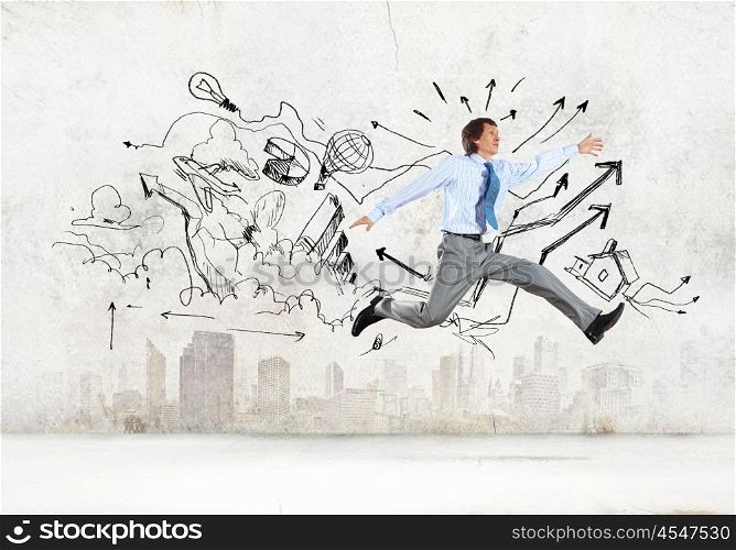 Jumping businessman. Image of businessman in jump against sketch background