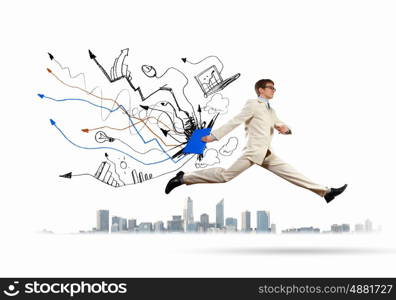 Jumping businessman. Image of businessman in jump against sketch background