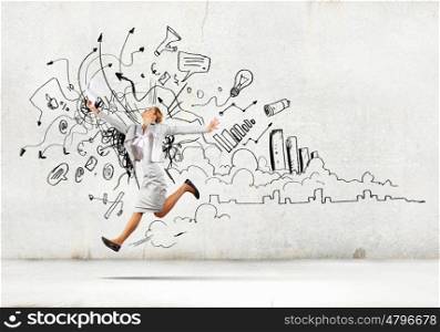 Jumping businesswoman. Image of businesswoman in jump against sketch background