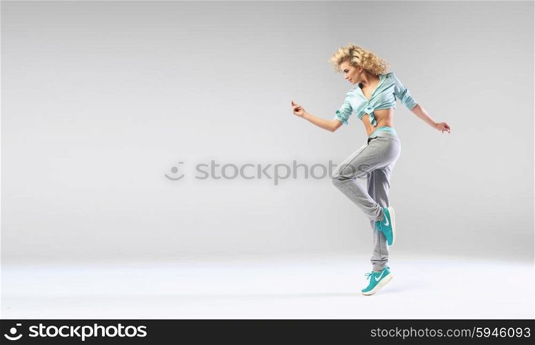 Jumping cheerful and attractive woman