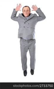 Jumping man senior in grey suit
