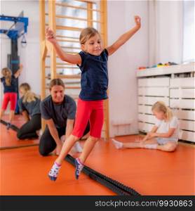 Jumping over rope in a physical activity class
