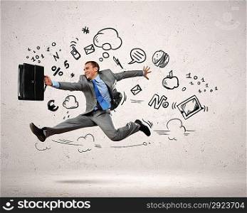 Jumping young businessman