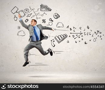 Jumping young businessman. Image of jumping young businessman. Business collage