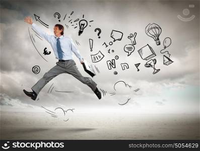 Jumping young businessman. Image of jumping young businessman. Business collage