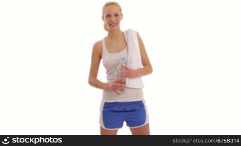 Junge Frau mit Wasserflasche im Sport-Dress.Fitness woman with PET water bottle in sport dress.