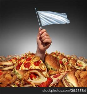 Junk food surrender and giving up fatty food or quitting a high fat lifestyle and dieting help concept as a hand holding a white flasg drowning in a heap of greasy fast food as a metaphor for changing eating habits by surrendering to diet advice.
