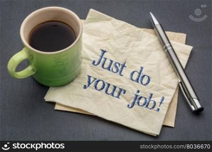 Just do your job! Handwriting on a napkin with cup of coffee against gray slate stone background