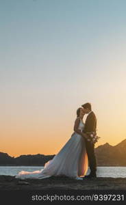 Just married couple against the sky with copy space