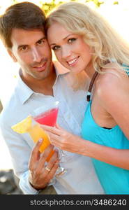 Just married couple having a cocktail in luxury resort