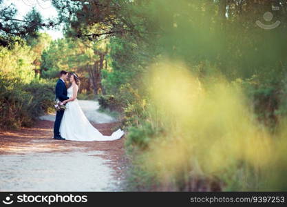 Just married couple on a forest with copy space