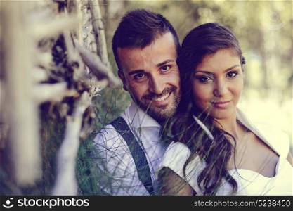 Just married couple together in nature background