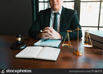 Justice and law concept with male lawyer in the office.