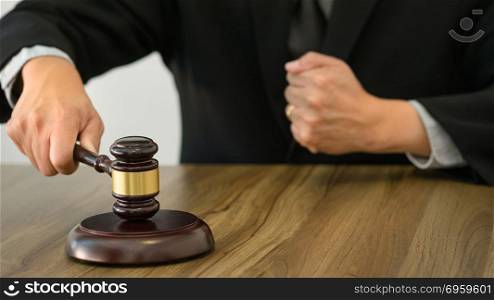 justice lawyer / judge gavel in a court room
