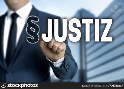 Justiz (in german Justice) is shown by businessman.. Justiz (in german Justice) is shown by businessman