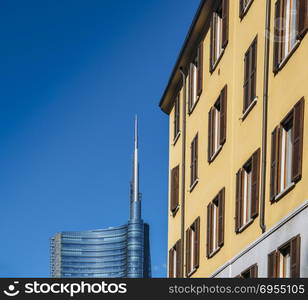 Juxtaposition of old and new styles of architecture in Milan, Lombardy, Italy.. Juxtaposition of old and new styles of architecture in Milan, Lombardy, Italy