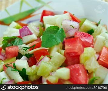Kachumbari - fresh tomato and onion salad. popular in cuisines of African Great Lakes region.