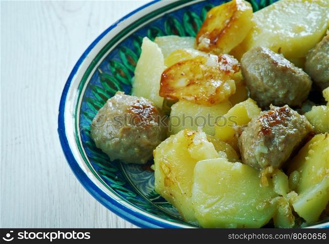 Kafta and Potatoes with Tahini Sauce - Mediterranean Meatballs .Palestinian style Kafta dish
