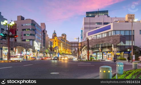 Kagoshima city downtown center, cityscape in Kyushu, Japan at sunset