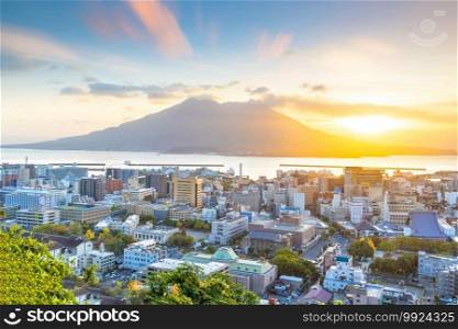 Kagoshima city downtown skyline cityscape  with Sakurajima Volcano in Kyushu, Japan at sunrise