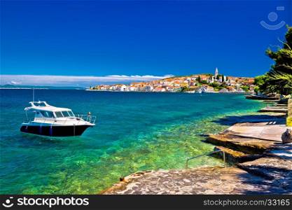 Kali beach and boat on turquoise sea, Island of Ugljan, Croatia
