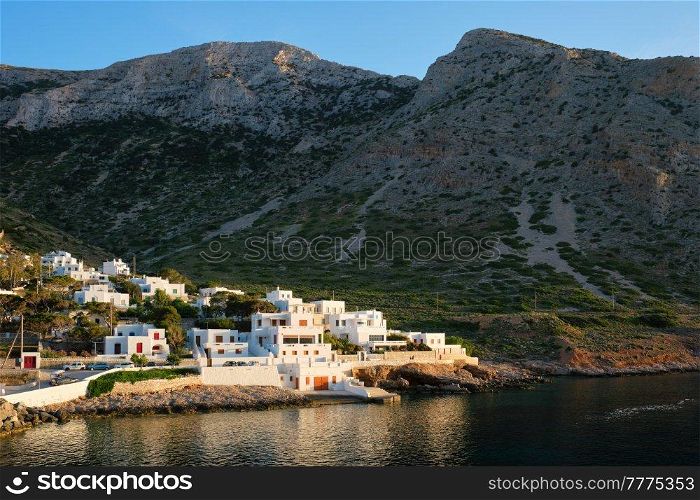 Kamares town on Sifnos island on sunset. Greece. Kamares town with traditional white houses on Sifnos island on sunset. Greece