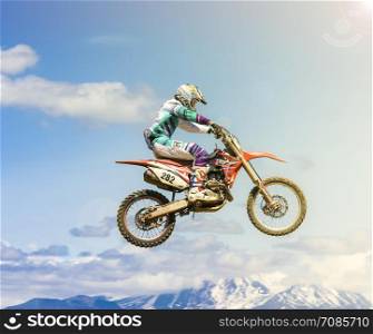 Kamchatka, Russia- 29 June 2019: Motocross riders practice tricks on their dirt bikes on a sunny day in Kamchatka
