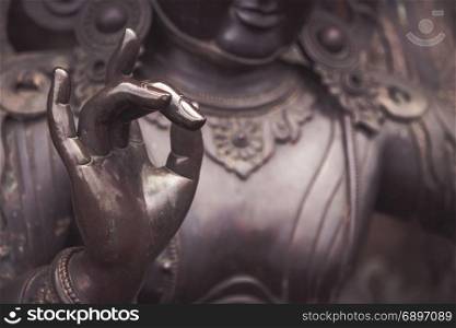 Karana mudra hand position expresses a very powerful energy with which negative energy is expelled. This hand gesture is also called warding off the evil. You can sense a very determined, focused energy just by looking at this hand gesture.