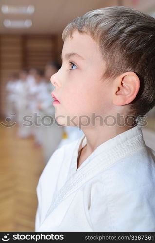 Karate boy in sport hall