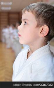 Karate boy in sport hall