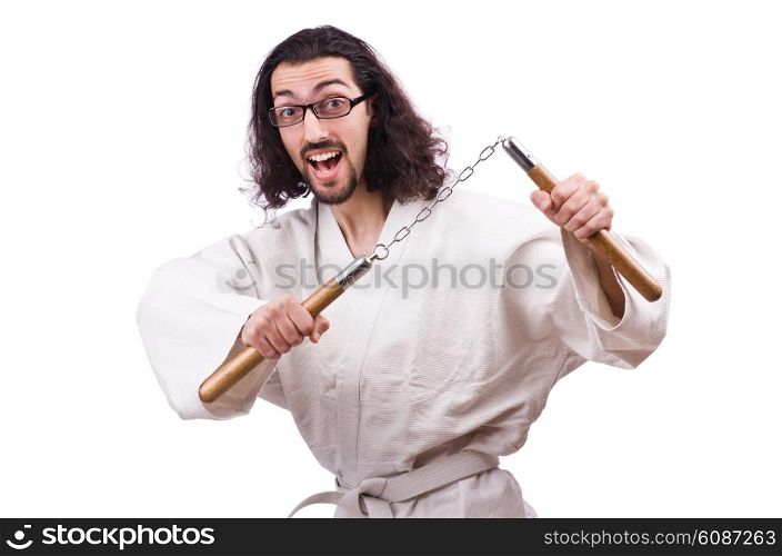 Karate man with nunchucks isolated on white