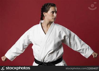 karate woman action isolated red background
