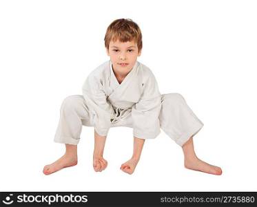 karateka boy in white kimono isolated on white background