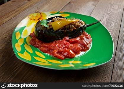 Karn?yar?k - Turkish and Iranian dish consisting of eggplant stuffed with a mix chopped onions, garlic, black pepper, tomatoes, parsley and ground meat.
