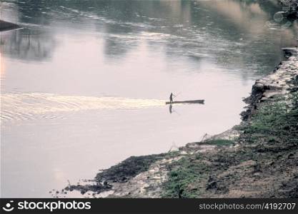 Karo Tribesman Canoeing on Omo River