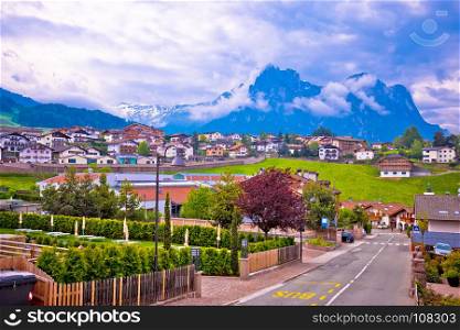Kastelruth and Schlern peak in Alps landscape view, Trentino Alto Adige region of Italy