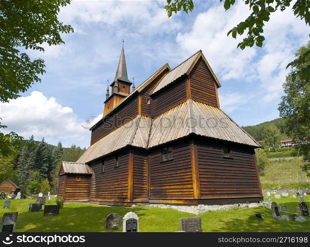 Kaupanger stave church (Kaupanger stavkyrkje) is the largest stave church in the Sogn og Fjordane, and is situated in the town of Kaupanger, Norway. The nave is supported by 22 staves, 8 on each of the longer sides and 3 on each of the shorter. The elevated chancel is carried by 4 free standing staves. The church has the largest number of staves to be found in any one stave church. It is still in use as a parish church, having been in use continuously since its erection.
