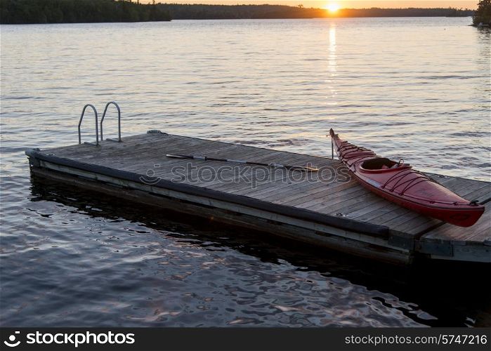 Kayak on a pier in a lake, Lake of The Woods, Ontario, Canada