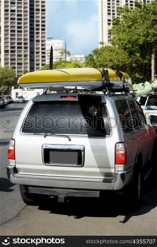Kayak over a car, Honolulu, Oahu, Hawaii Islands, USA