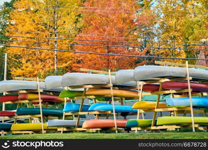 Kayak rack on Rangeley Lake at autumn, Oquossoc, Maine, USA. 