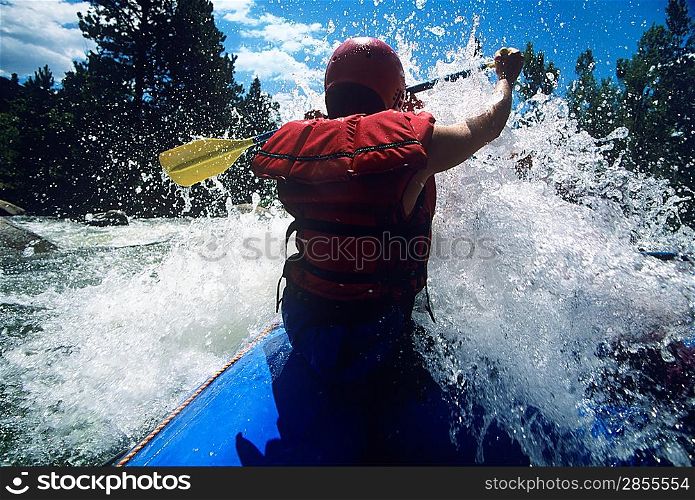 Kayaker Hitting the Rapids